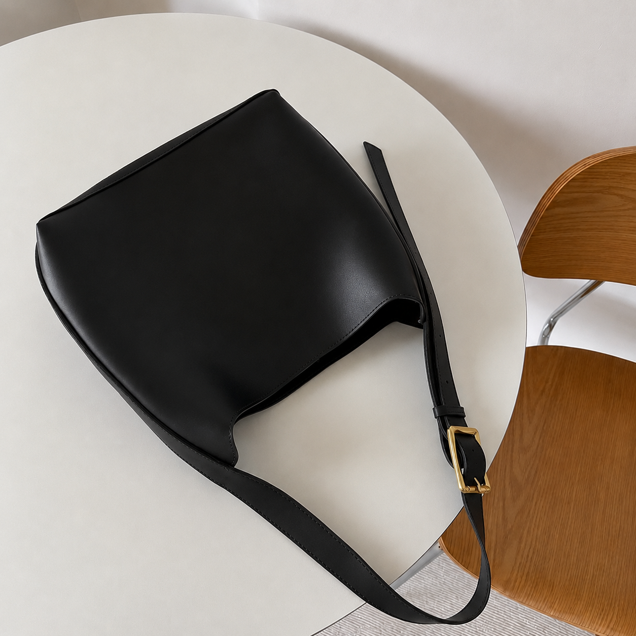 adjustable strap black bag