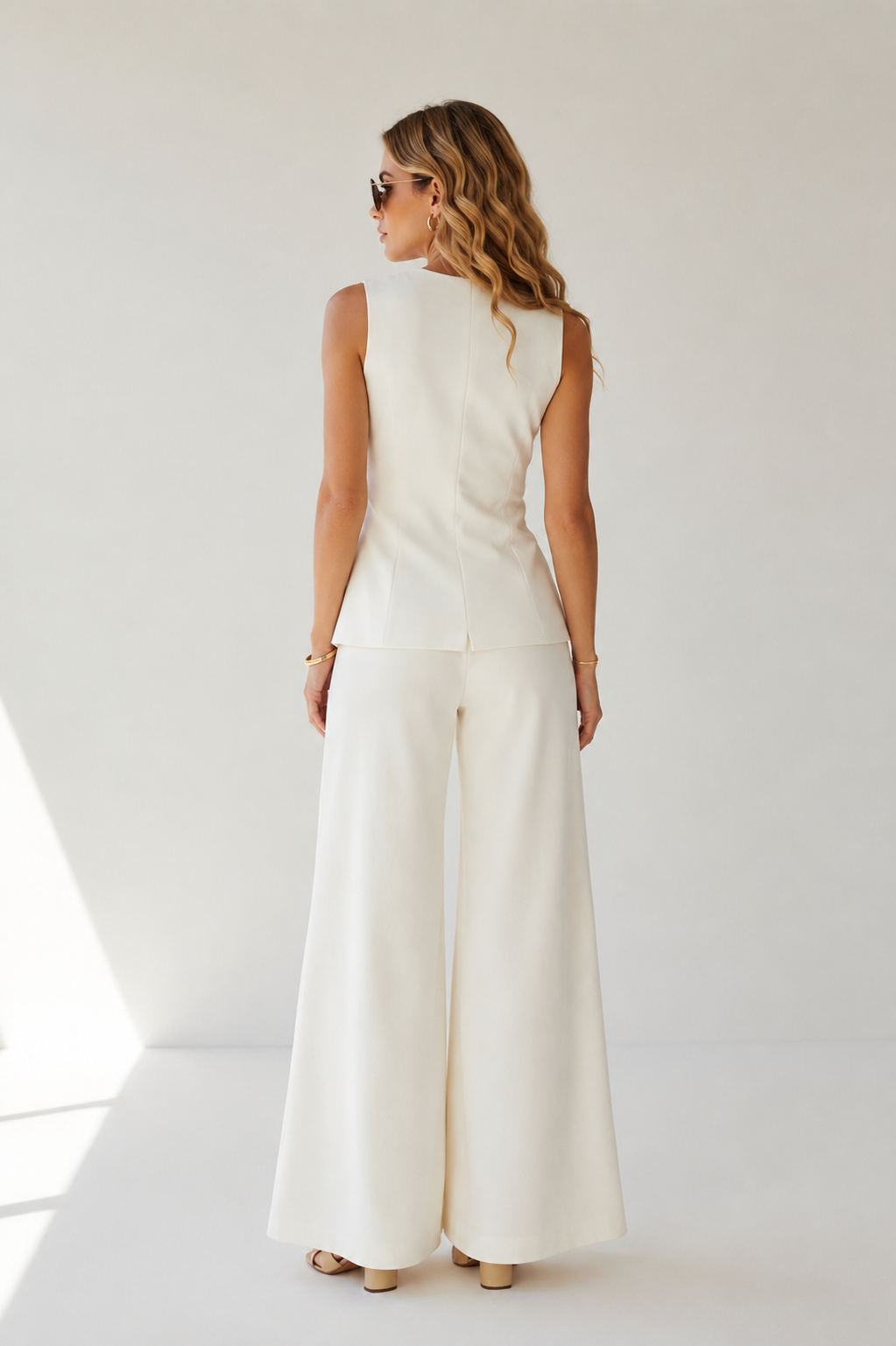 sleeveless top wide leg trousers